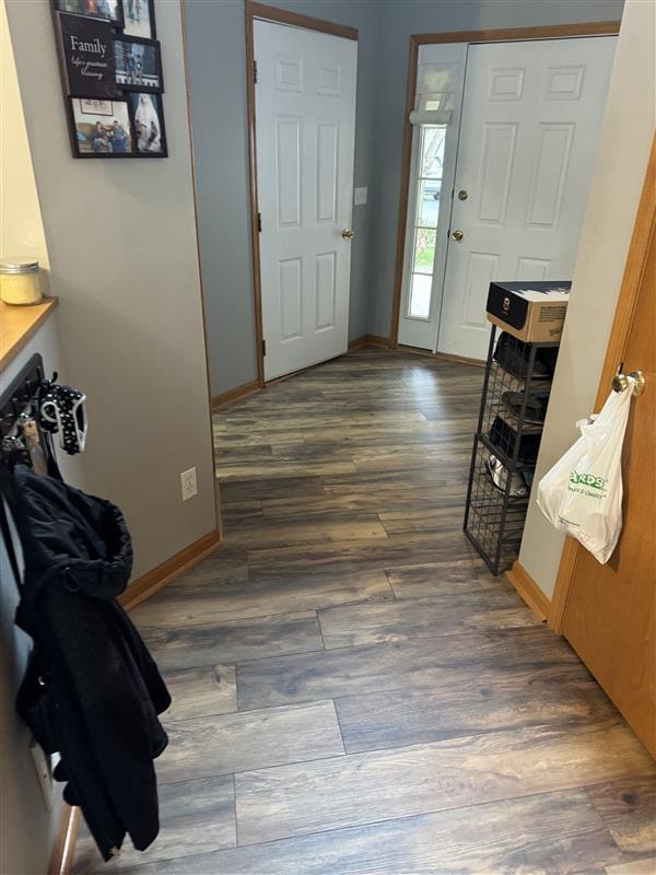 Residential entryway with new wood-look plank flooring